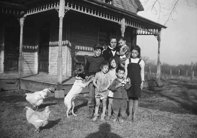 Glenn, Dorothy, Kay, Barb, Hazel, Nella, and Betty McDowell along with Bob, the wonder dog