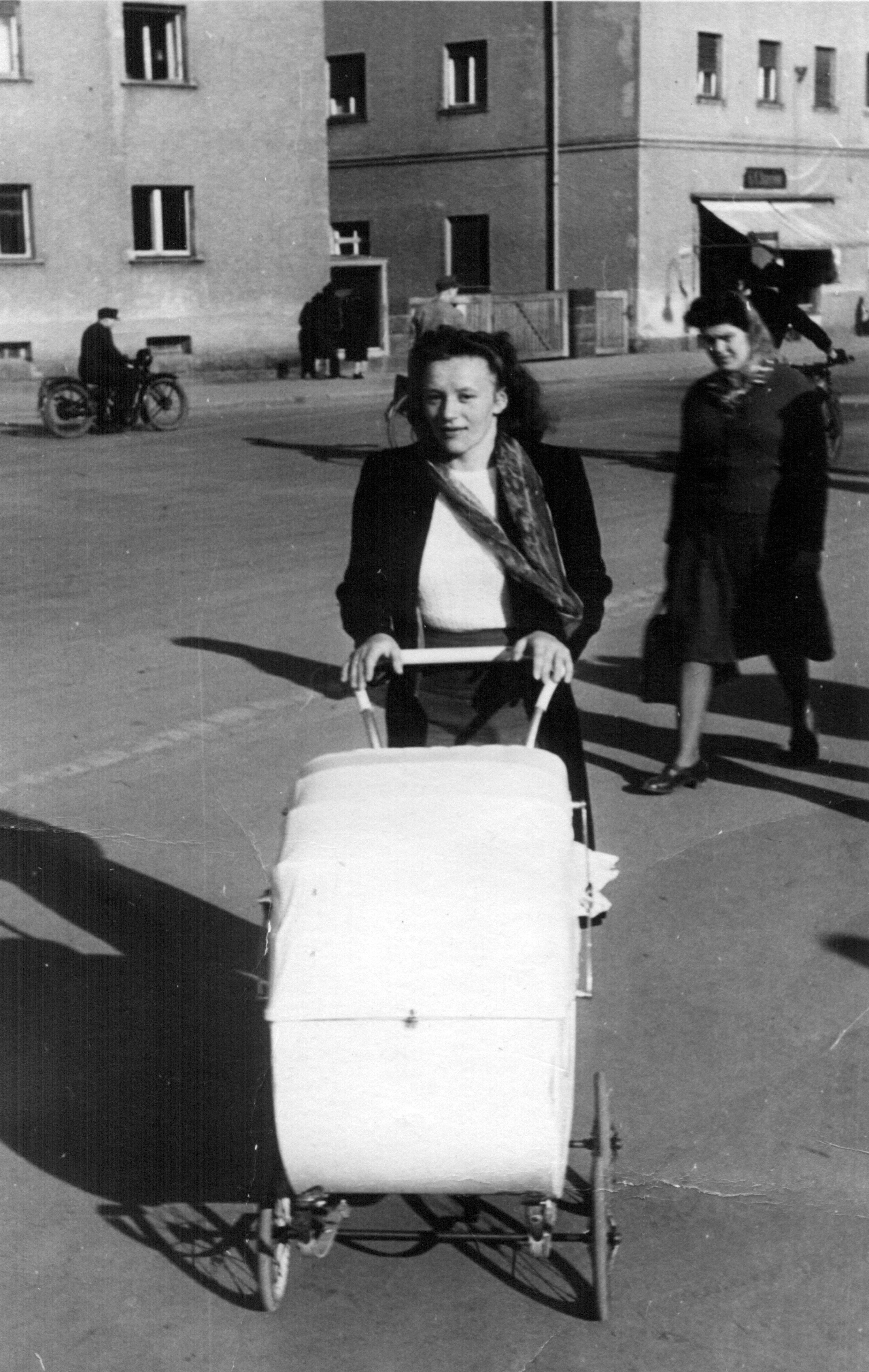 Margarete Bauer with Karin in the buggy, 1950